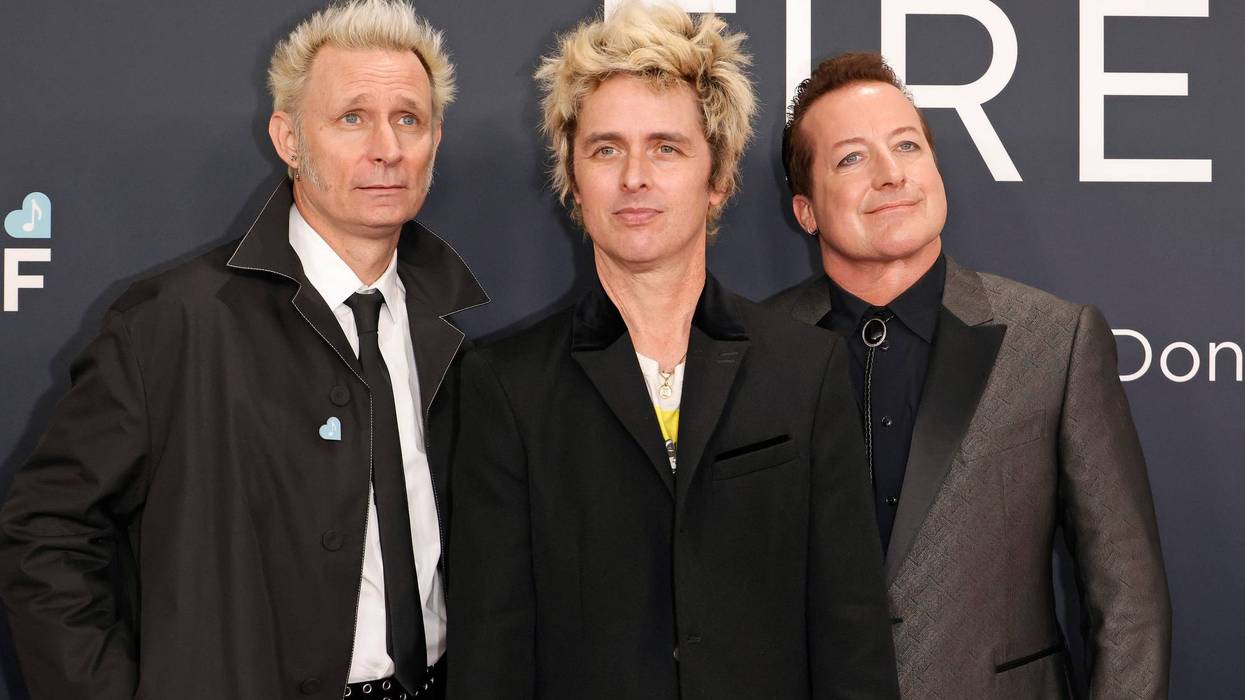 (L-R) Mike Dirnt, Billie Joe Armstrong, and Tré Cool of Green Day attend the 67th GRAMMY Awards on February 02, 2025 in Los Angeles, California.