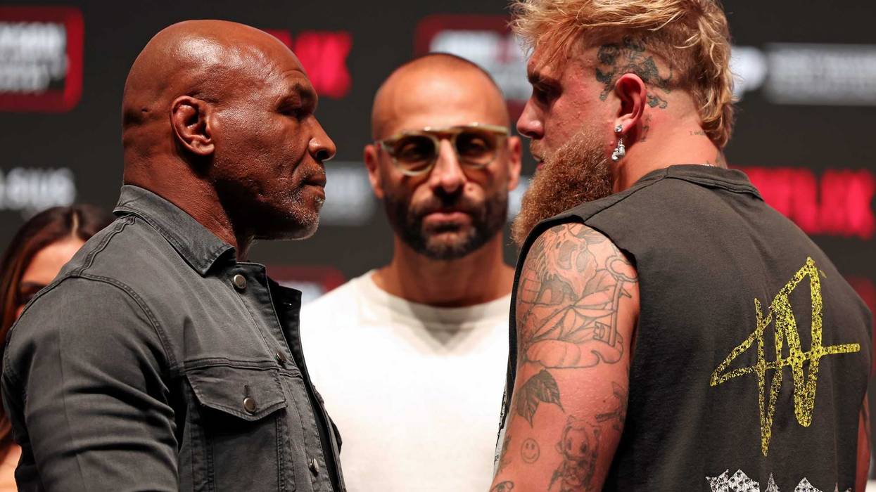 (L-R) Mike Tyson, Nakisa Bidarian, and Jake Paul attend the press conference for LIVE on Netflix: Jake Paul vs. Mike Tyson at the Toyota Music Factory on November 13, 2024 in Dallas, Texas.