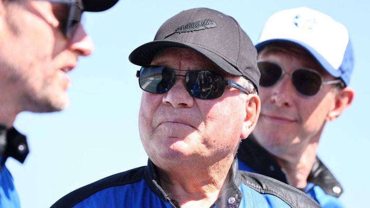 (L-R) Planet Labs co-founder Chris Boshuizen, Star Trek actor William Shatner, and Medidata Solutions co-founder Glen de Vries attend a media availability on the landing pad of Blue Origin’s New Shepard after they flew into space on October 13, 2021 near Van Horn, Texas.
