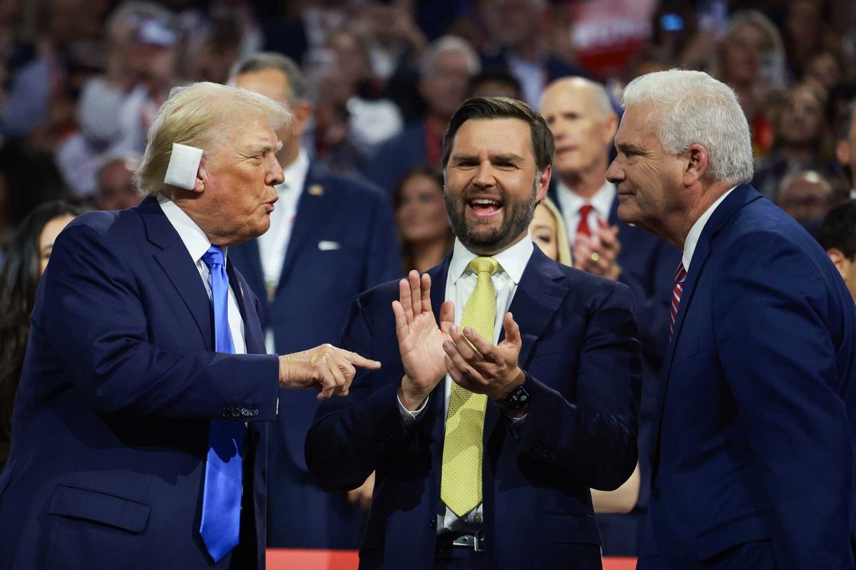 (L-R) Republican presidential candidate, former U.S. President Donald Trump speaks with Republican vice presidential candidate, U.S. Sen. J.D. Vance (R-OH) and House Majority Whip Rep. Tom Emmer (R-MN) on the second day of the Republican National Convention at the Fiserv Forum on July 16, 2024 in Milwaukee, Wisconsin.