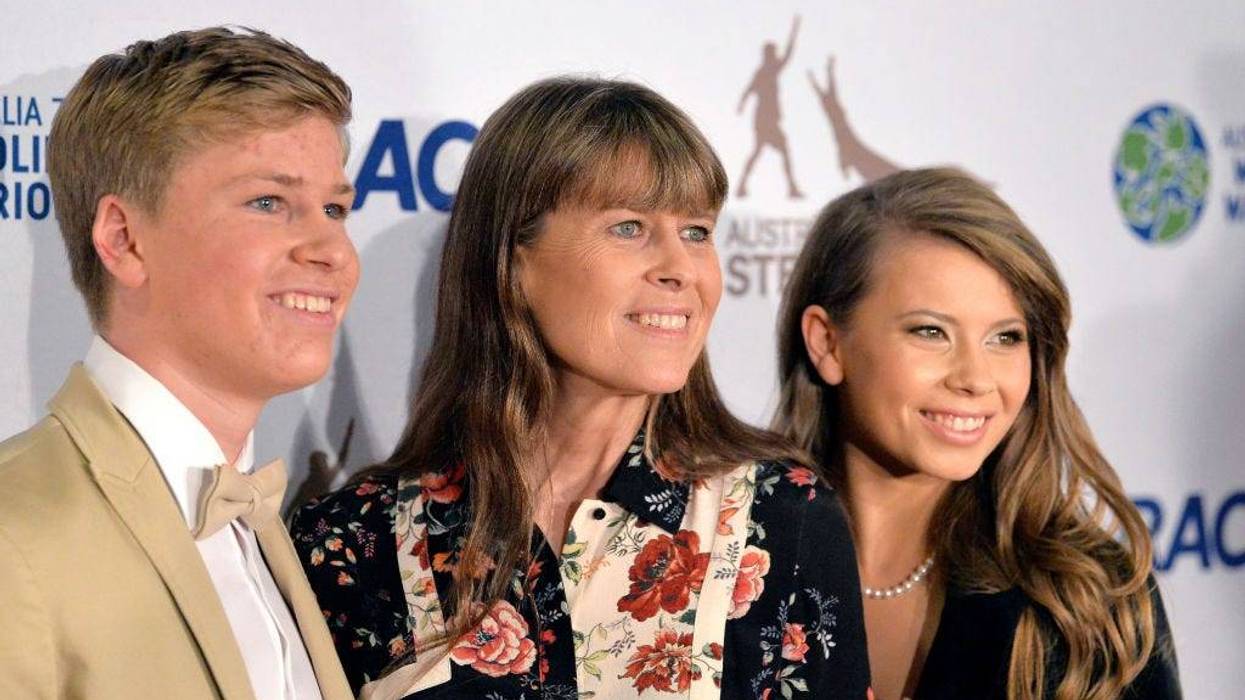 (L-R) Robert Irwin, Terri Irwin and Bindi Irwin pose for a photo at the annual Steve Irwin Gala Dinner at Brisbane Convention & Exhibition Centre on November 09, 2019 in Brisbane, Australia