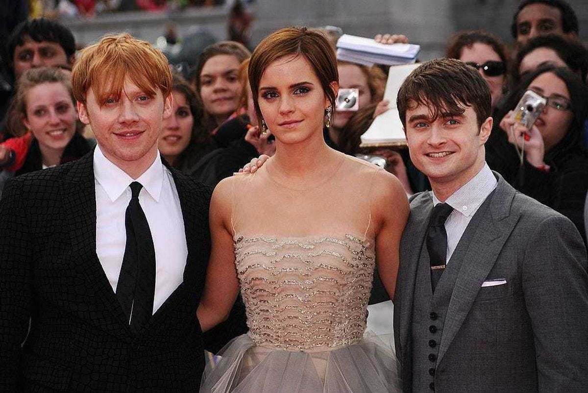 (L-R) Rupert Grint, Emma Watson and Daniel Radcliffe attend the World Premiere of Harry Potter and The Deathly Hallows - Part 2 at Trafalgar Square on July 7, 2011 in London, England. (
