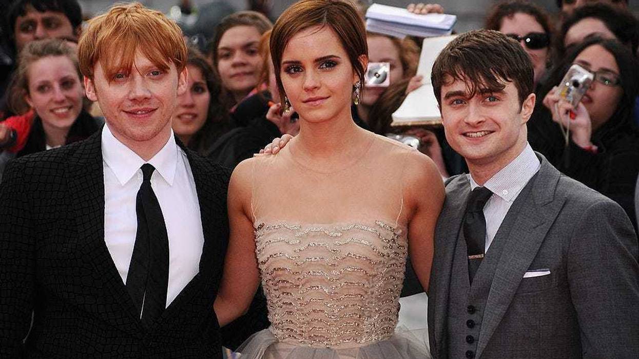 (L-R) Rupert Grint, Emma Watson and Daniel Radcliffe attend the World Premiere of Harry Potter and The Deathly Hallows - Part 2 at Trafalgar Square on July 7, 2011 in London, England. (