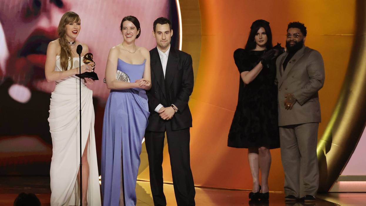 L-R) Taylor Swift accepts the Album Of The Year award for "Midnights" with Laura Sisk, Jack Antonoff and Lana Del Rey onstage during the 66th GRAMMY Awards at Crypto.com Arena on February 04, 2024 in Los Angeles, California.