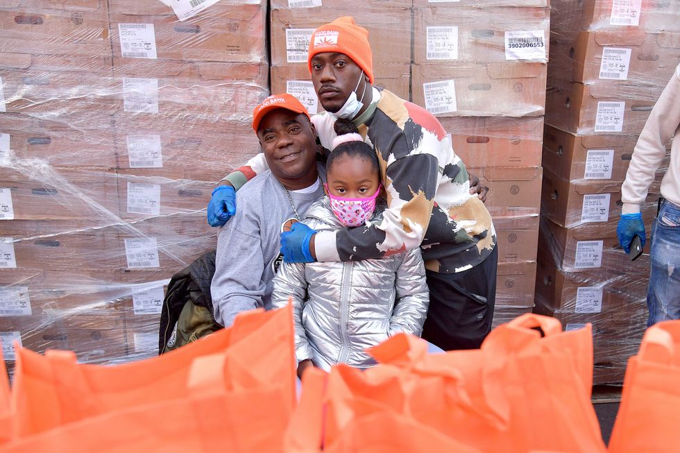 (L-R) Tracy Morgan, Maven Sonae Morgan, and Tracy Morgan Jr. pose as Food Bank For New York City, Tracy Morgan, and Council Member Robert E. Cornegy Jr. distribute turkeys to Brooklyn families in celebration of Thanksgiving on November 21, 2020 in Brooklyn, New York.