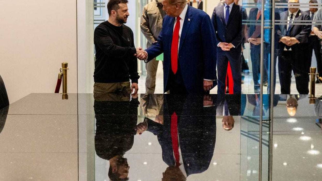 (L-R) Ukrainian President Volodymyr Zelensky and Republican presidential nominee, former U.S. President Donald Trump, shake hands during a meeting on September 27, 2024 in New York City.