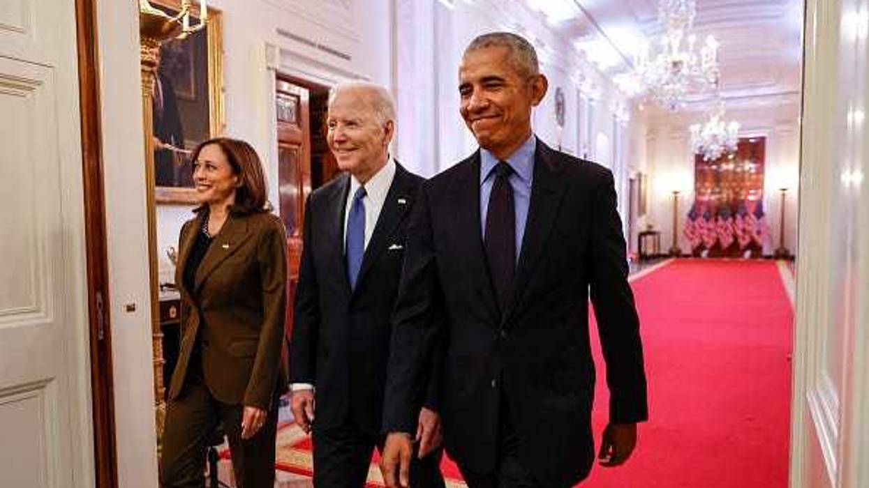 (L-R) Vice President Kamala Harris, former President Barack Obama, and U.S. President Joe Biden arrive for an event to mark the 2010 passage of the Affordable Care Act in the East Room of the White House on April 5, 2022 in Washington, DC.