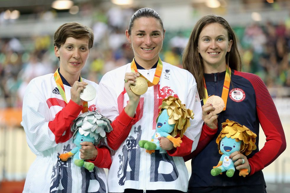 (L to R) Silver medalist Crystal Lane of Great Britain, gold medalist Sarah Storey of Great Britain and bronze medalist Samantha Bosco of the United States celebrate on the podium at the medal ceremony for the women
