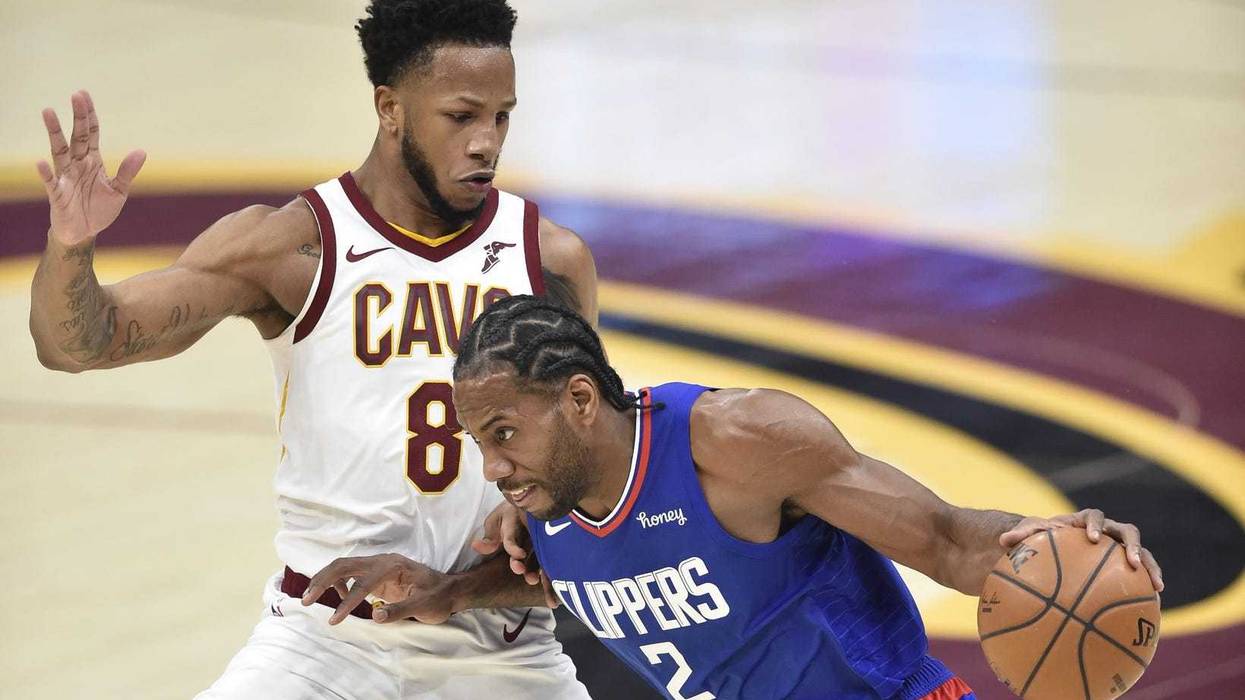 LA Clippers forward Kawhi Leonard (2) drives to the basket against Cleveland Cavaliers forward Lamar Stevens (8)