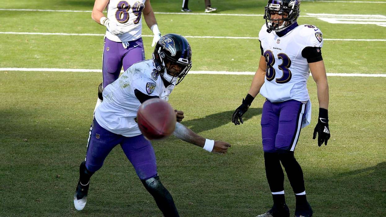 Lamar Jackson celebrates a 48-yard TD run during the Ravens 20-13 victory over the Titans.