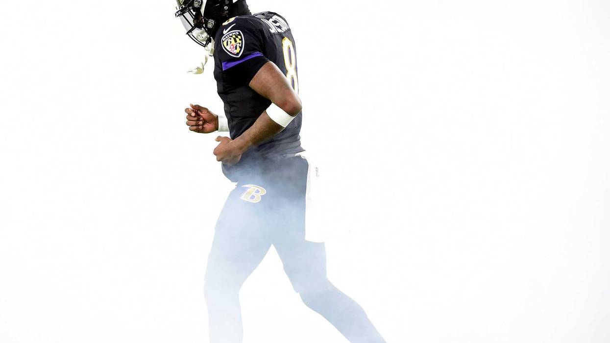 Lamar Jackson walks out of the tunnel in his first game back since his Covid-19 diagnosis.
