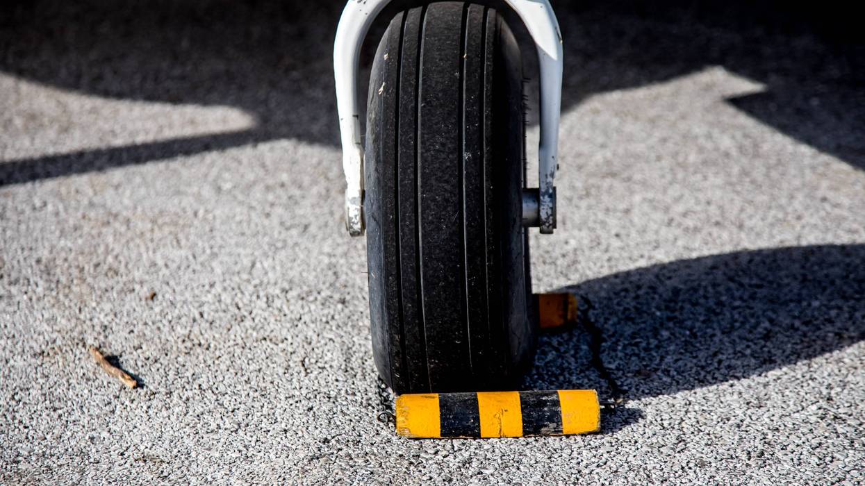 Landing wheels of a small airplane at an airport