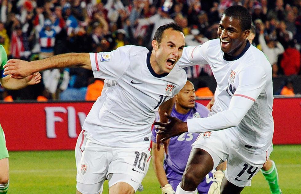 Landon Donovan of the United States celebrates after scoring the winning goal in 2010