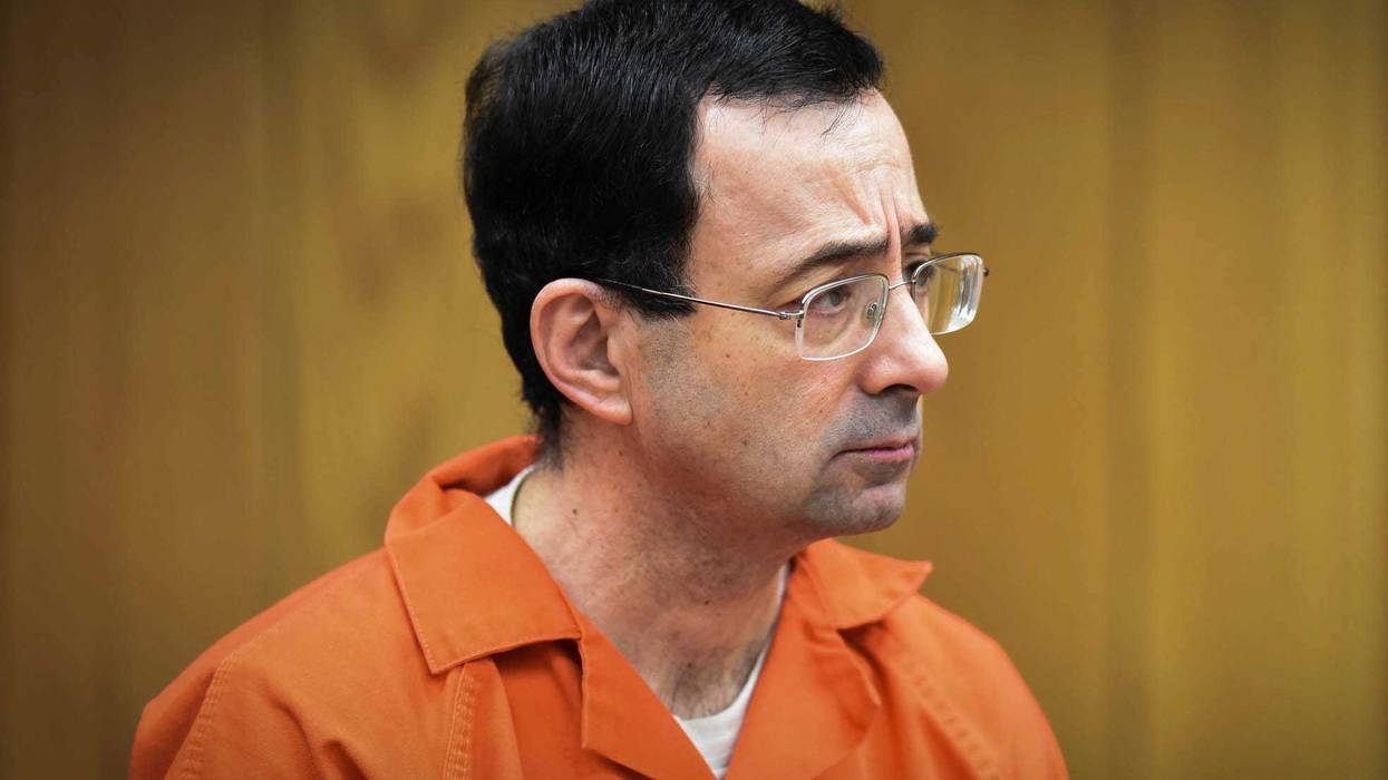 Larry Nassar listens as he is sentenced Monday, Feb. 5, 2018, in Judge Janice Cunningham's Eaton County Court.