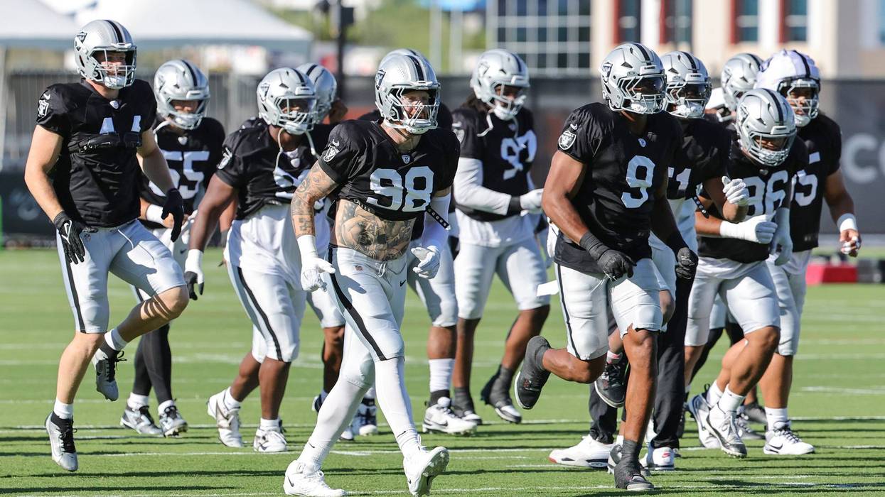 Las Vegas Raiders defensive players, including Maxx Crosby #98 and Tyree Wilson #9, practice during the team's training camp at the Las Vegas Raiders Headquarters/Intermountain Health Performance Center on July 31, 2025 in Henderson, Nevada.