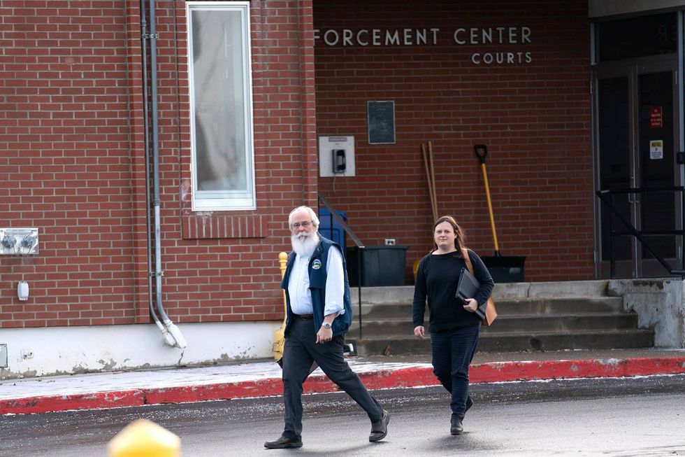 Latah County Prosecutor Bill Thompson, left, and Ashley Jennings, senior deputy prosecutor, leave the Latah County Courthouse, Wednesday, Jan. 4, 2023, in Moscow, Idaho.
