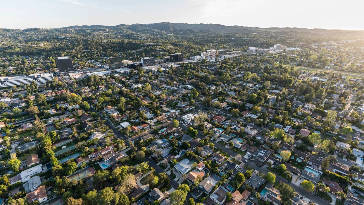 Late afternoon aerial view of Sherman Oaks and Encino in the San Fernando Valley area of Los Angeles, California.