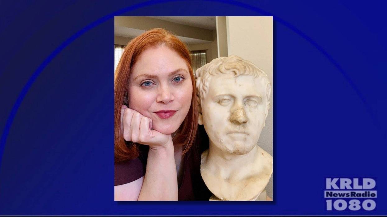 Laura Young with the Portrait of a man.