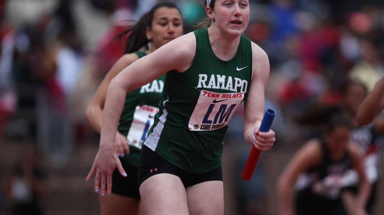 Lauren Brzozowski of Ramapo runs the anchor leg of the 4x100 at Franklin Field in Philadelphia.