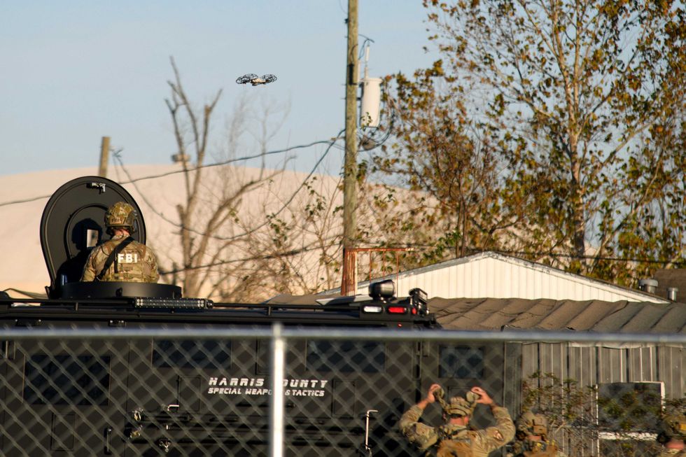 Law enforcement conduct an investigation in connection with the New Orleans terrorist attack near the intersection of Hugh Road and Crescent Peak Drive in Houston, Texas on January 1, 2025