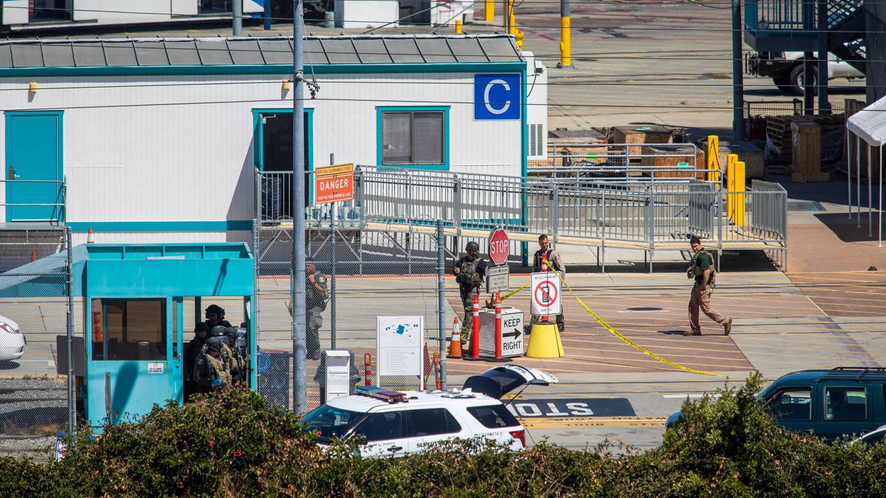 Law enforcement gather at the Valley Transportation Authority (VTA) light-rail yard where a mass shooting occurred on May 26, 2021 in San Jose, California