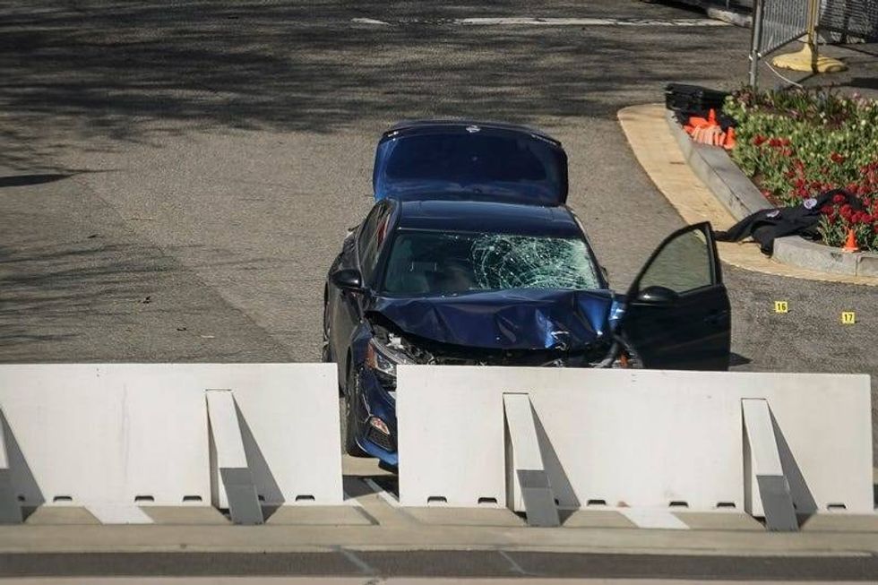 Law enforcement investigate the scene after a vehicle charged a barricade at the U.S. Capitol on April 02, 2021 in Washington, DC.