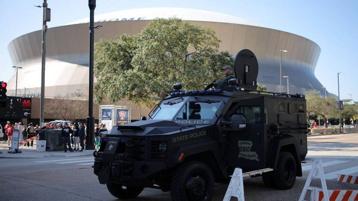 Law enforcement officers patrol the exterior of the Caesars Superdome prior to the Allstate Sugar Bowl on January 02, 2025 in New Orleans, Louisiana. (Photo by Jonathan Bachman/Getty Images)