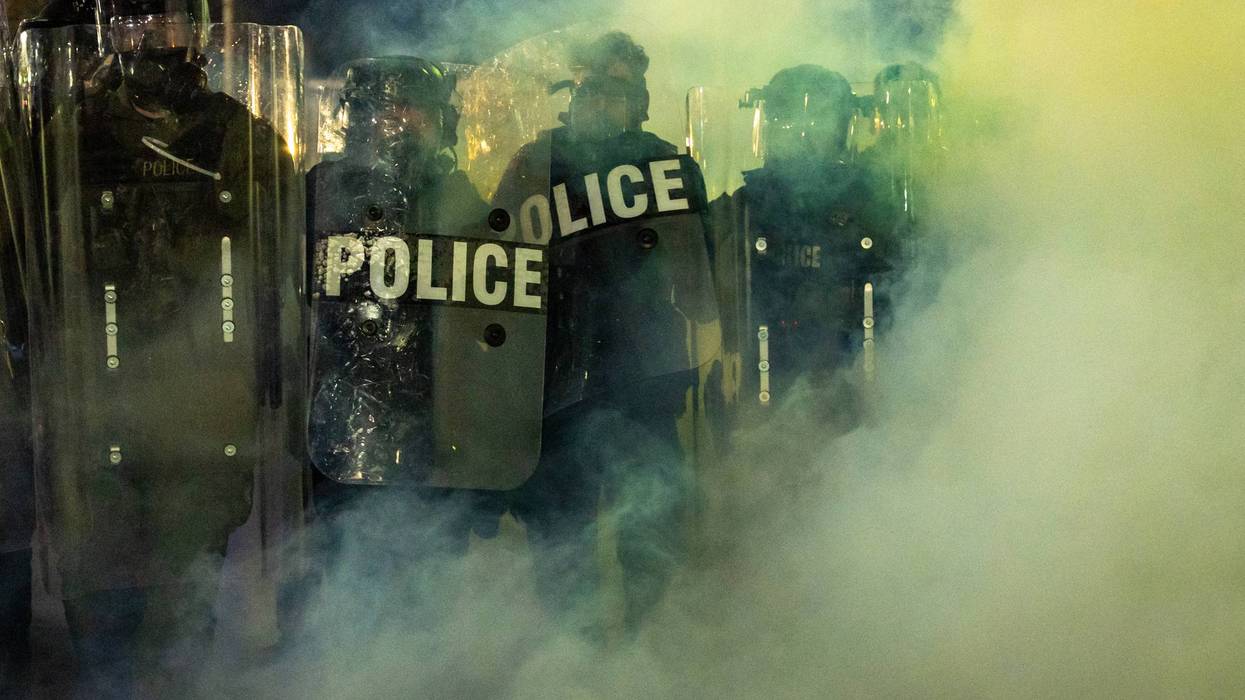 New Jersey police sergeant charged with stealing journalist's camera bag at immigration protest
