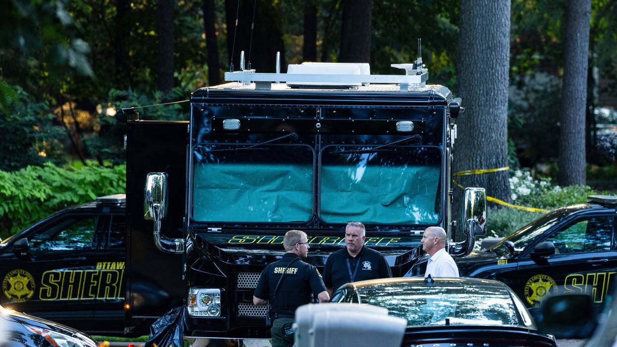 Officials say man killed wife and 6 kids, then himself, before all were found in Michigan home fire
