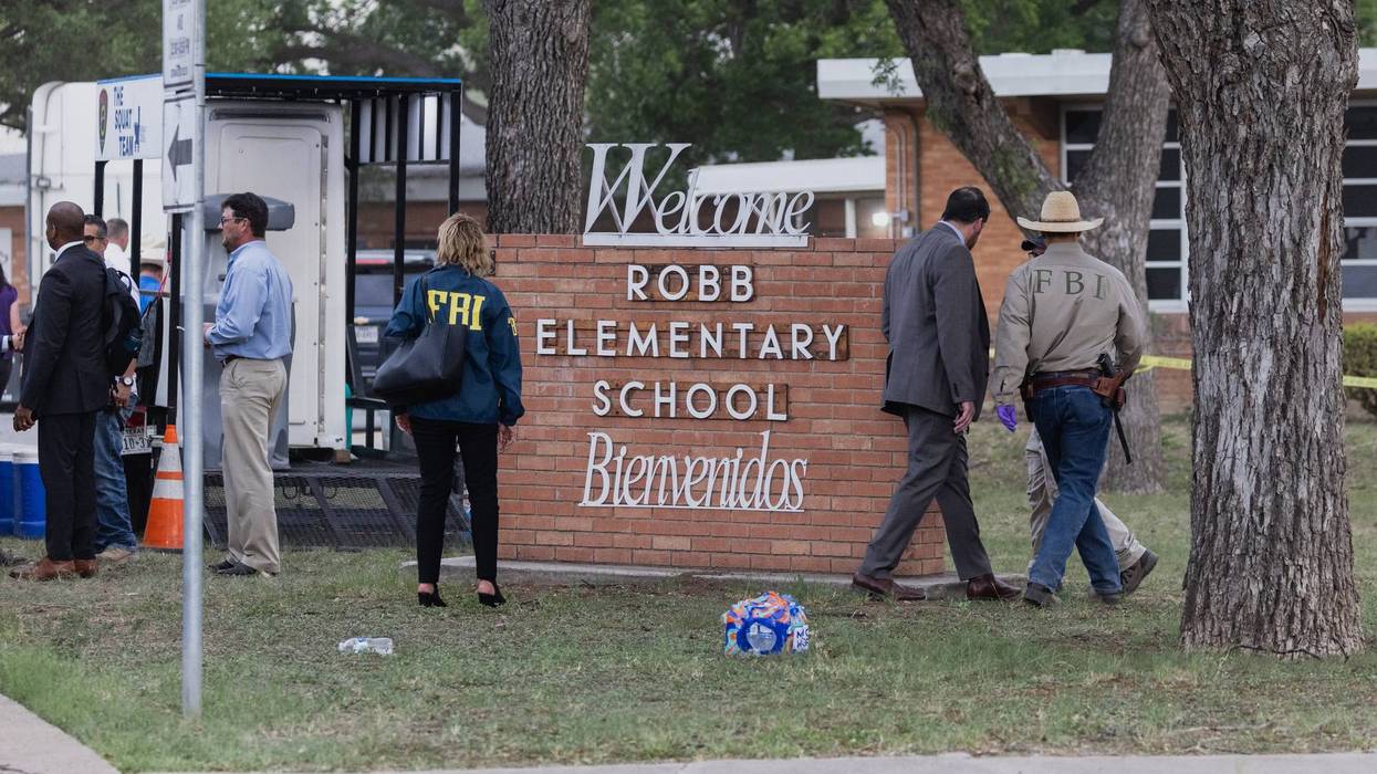 Law enforcement work the scene after a mass shooting at Robb Elementary School where 19 people, including 18 children, were killed on May 24, 2022 in Uvalde, Texas.