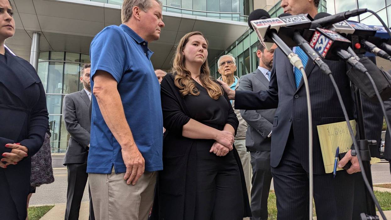 Leah Sundheim, center, waits to speak to the media outside the Lake County Courthouse on Wednesday in Waukegan, where man accused of killing seven people at the 2022 Highland Park Fourth of July Parade rejected his plea deal.