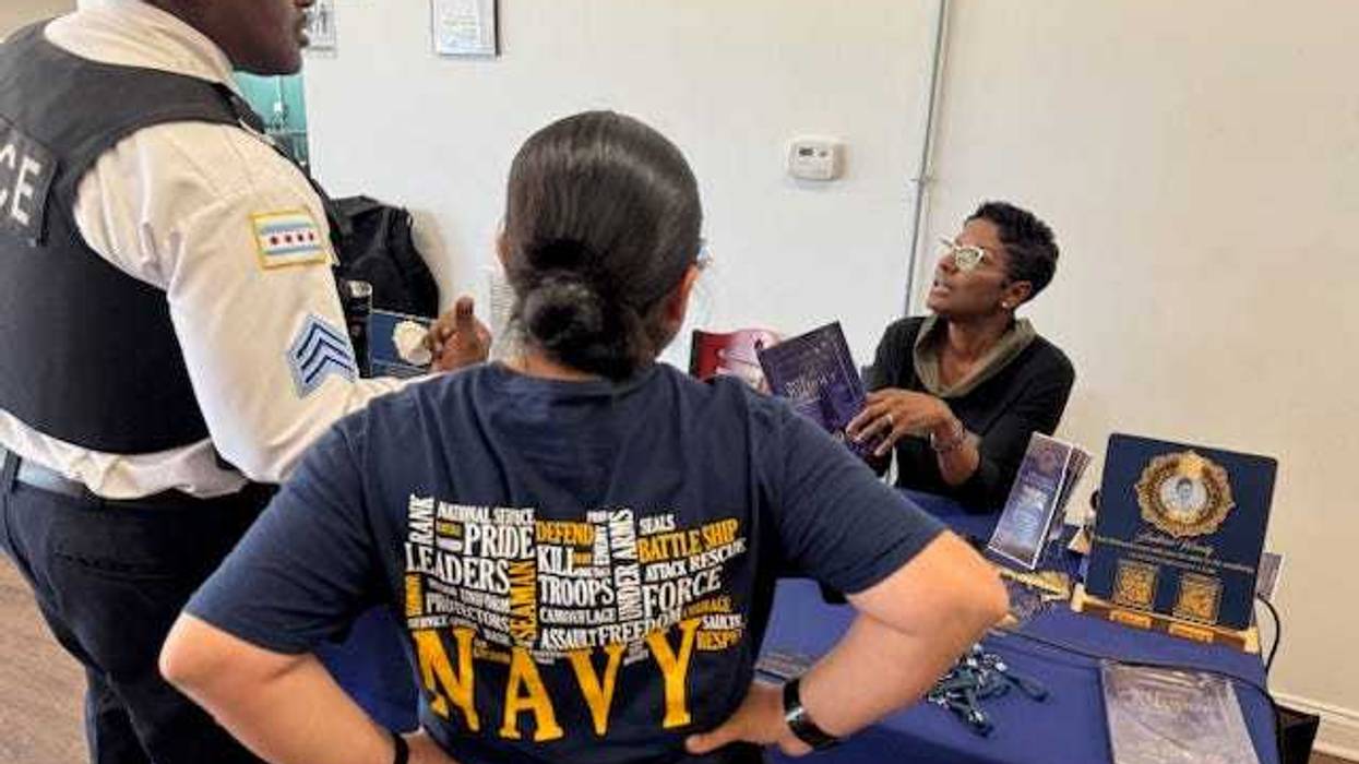 Leatrice Woody meets with visitors at her community event