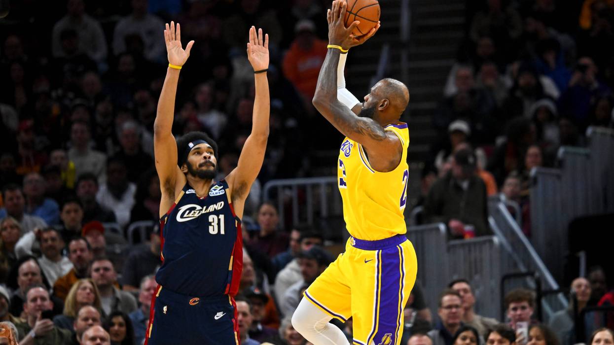 LeBron James #23 of the Los Angeles Lakers shoots over Jarrett Allen #31 of the Cleveland Cavaliers during the third quarter at Rocket Arena on January 28, 2026 in Cleveland, Ohio. The Cavaliers defeated the Lakers 129-99.