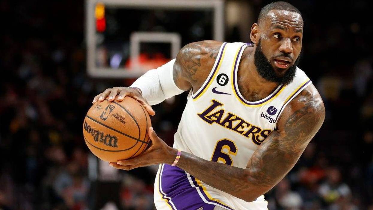 LeBron James #6 of the Los Angeles Lakers looks to pass against the Portland Trail Blazers during the first half at Moda Center on January 22, 2023 in Portland, Oregon.