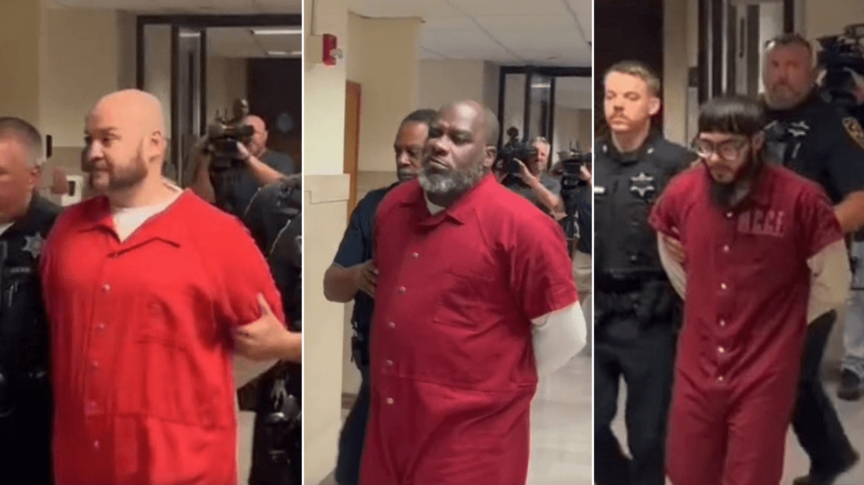 Left to right: Charles Fulforth, Kelvin Roberts and Jeremy Fuentes are led from the courtroom in Norristown after being sentenced to life in prison.