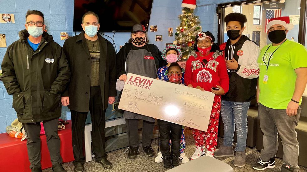 (Left to Right) Marty Griffin, Ken Coury, Rita and 4 of 6 children, Juan Perez