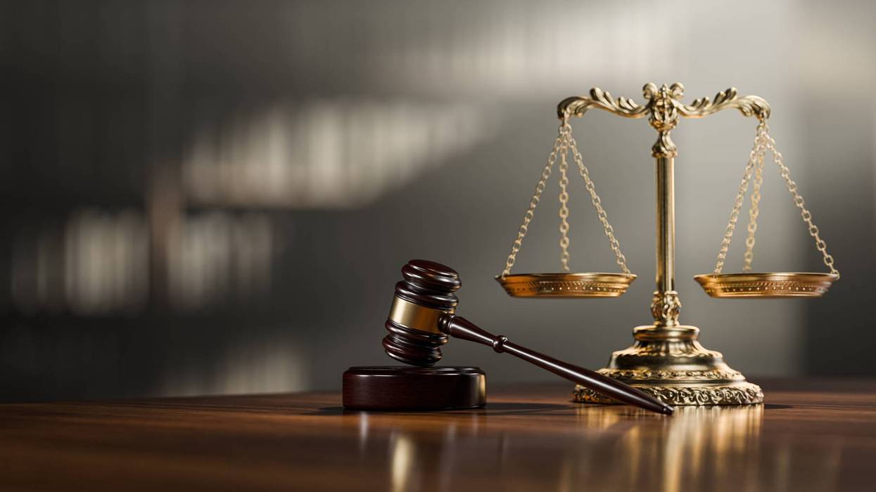 Legal concept: Scales of justice and and the judge's gavel hammer as a symbol of law and order