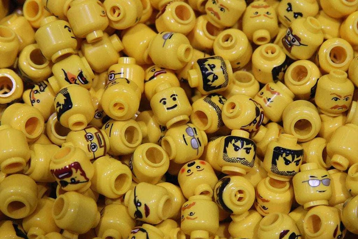 Lego figure heads are displayed on the opening day of BRICK 2014 at the Excel Centre on November 27, 2014 in London, England. The four day event showcases creations by some of the world's best Lego builders and runs until November 30th.