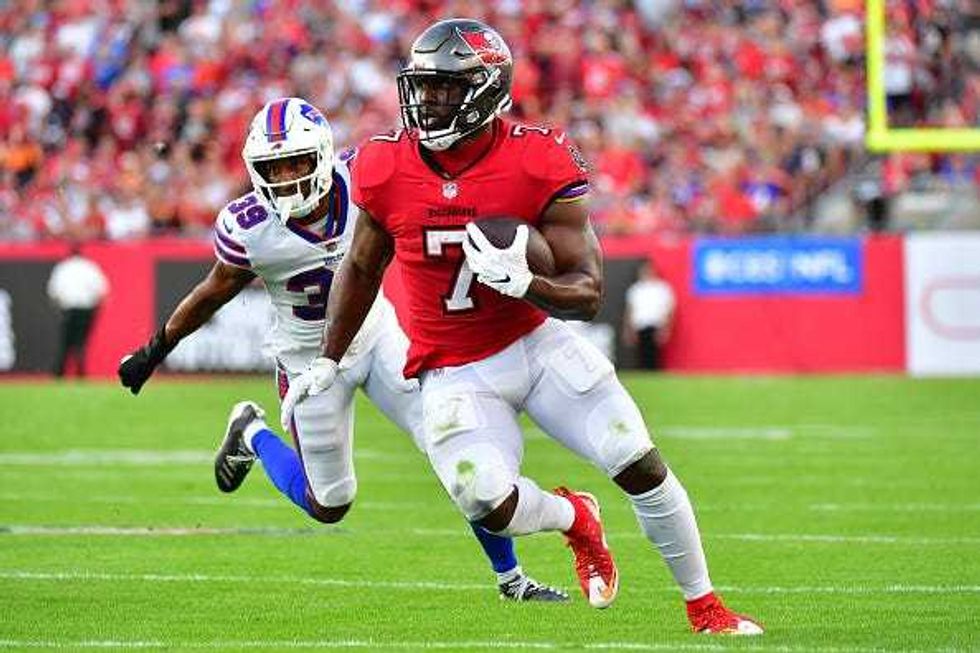Leonard Fournette looks for room to run against the Bills