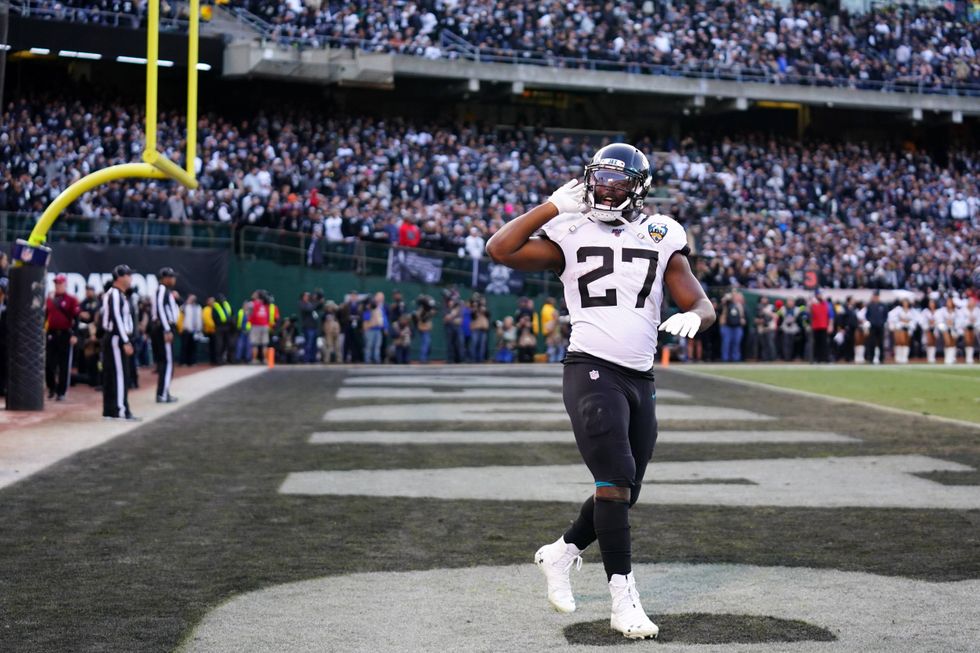 Leonard Fournette taunting the crowd after a touchdown against the Raiders
