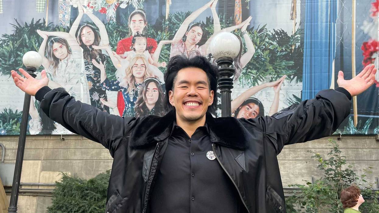 Leonard Suryajaya stands in front of Kin Link, his latest installation, which will adorn the Chicago Riverwalk east of Michigan Avenue for about one year.
