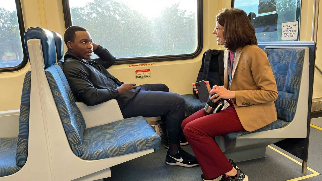 Lesley Kandaras, general manager of Metro Transit, talking to a rider.