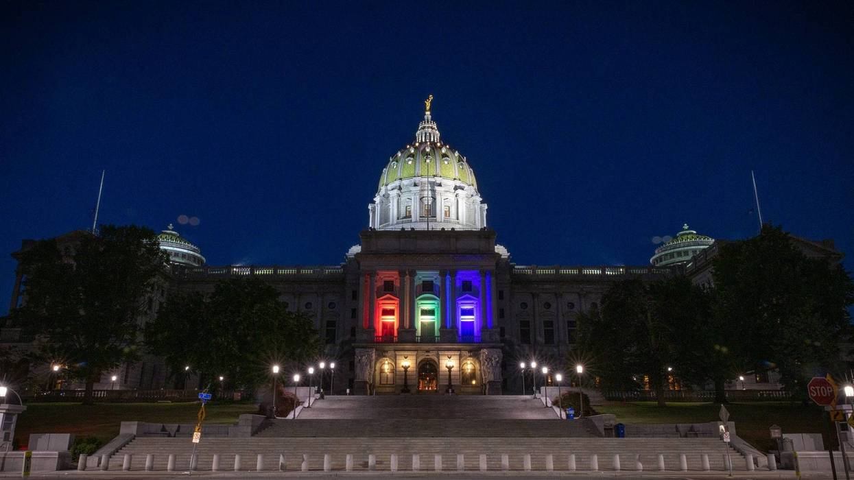 LGBTQ pride colors are displayed on the state Capitol in Harrisburg, Pennsylvania.