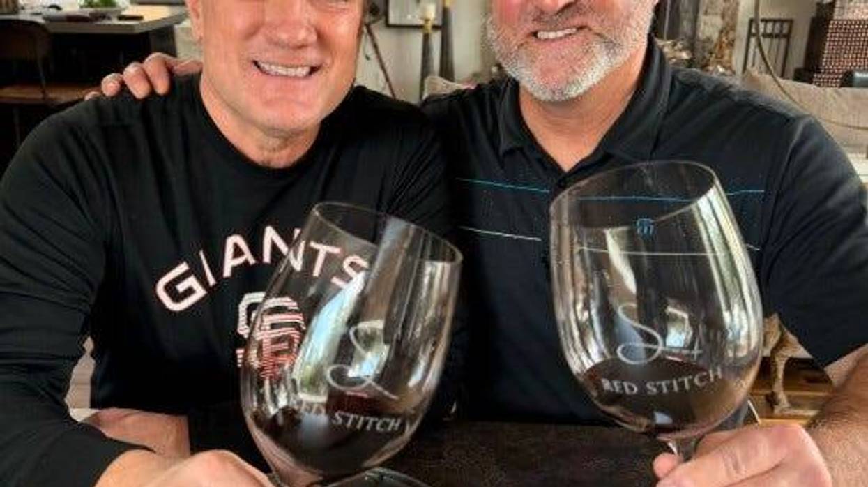 Liam Mayclem and Rich Aurilia tasting Red Stitch Wine.