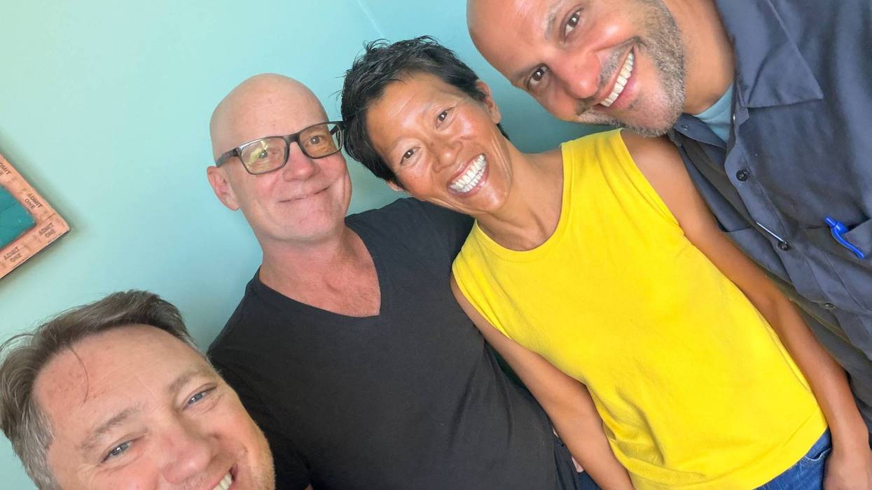 Liam Mayclem with Brian Leightner, Annette Yang, and Aaron Lucich.