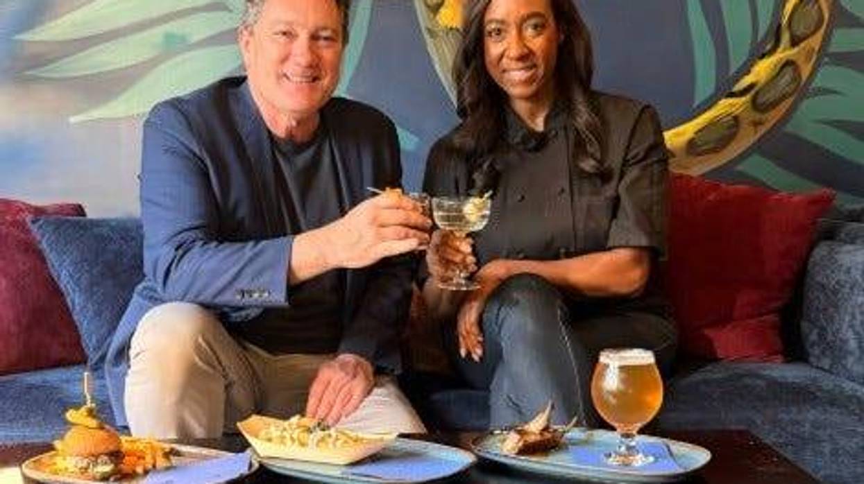 Liam Mayclem with Chef Michele McQueen at Lucy Blue in Oakland.