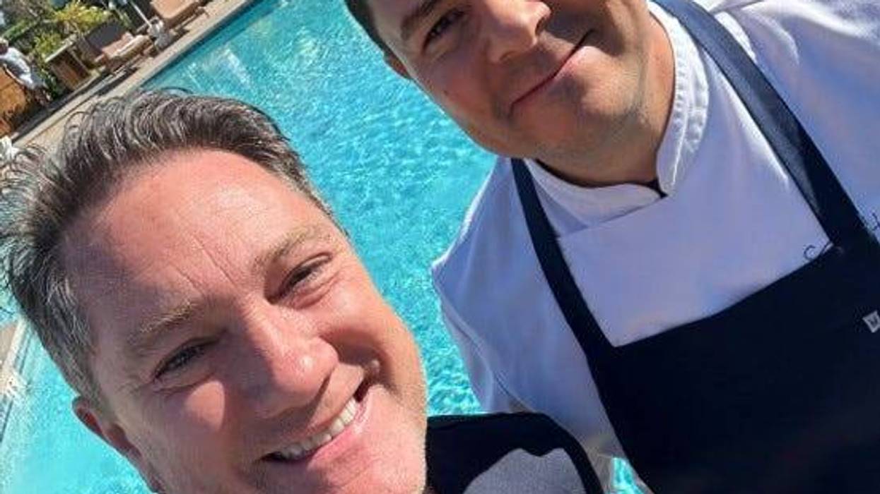 Liam Mayclem with Executive Chef Sergio Howland.