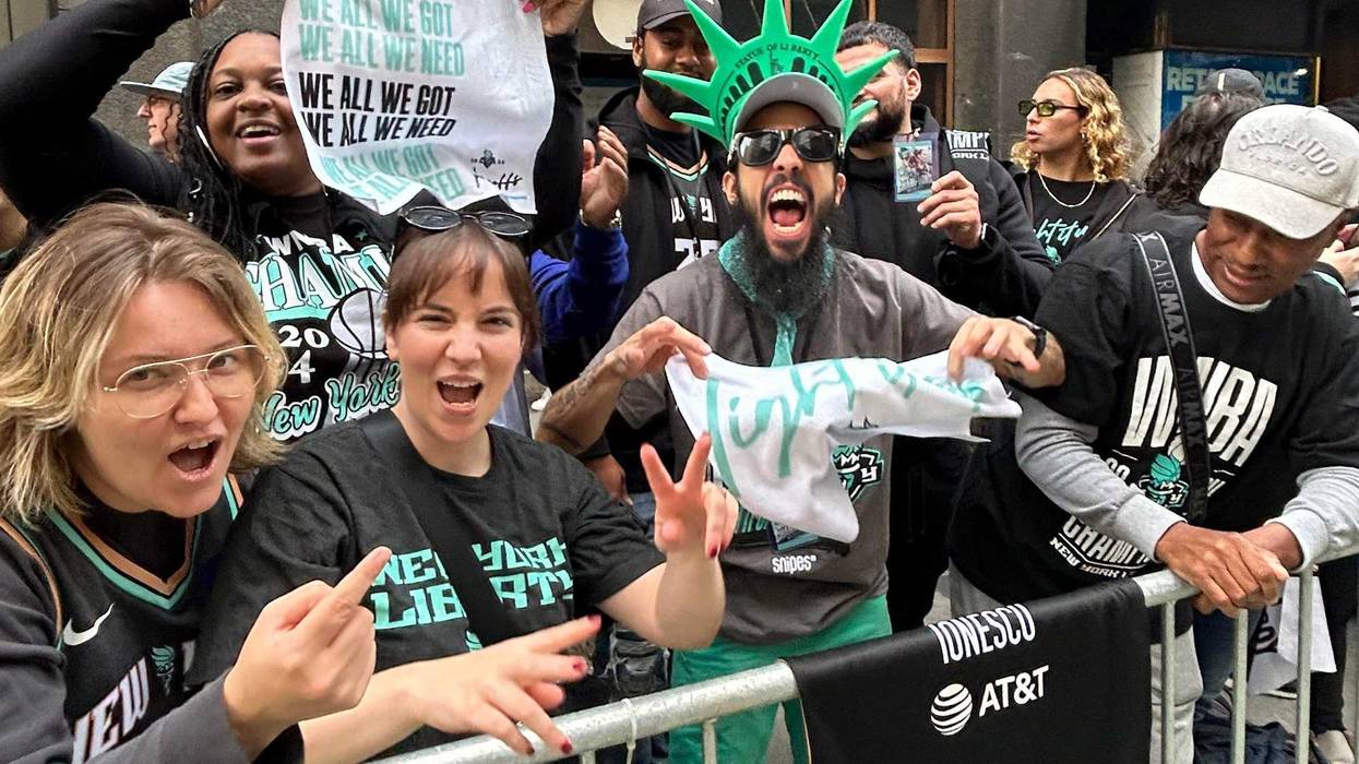 Liberty fans celebrate along the parade route