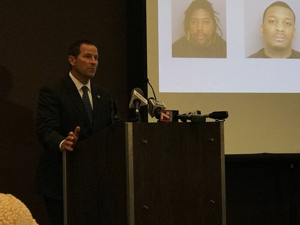 Lieutenant Tim Conroy of the GPD speaks at a press conference announcing the arrests of three men in Cobey Smith