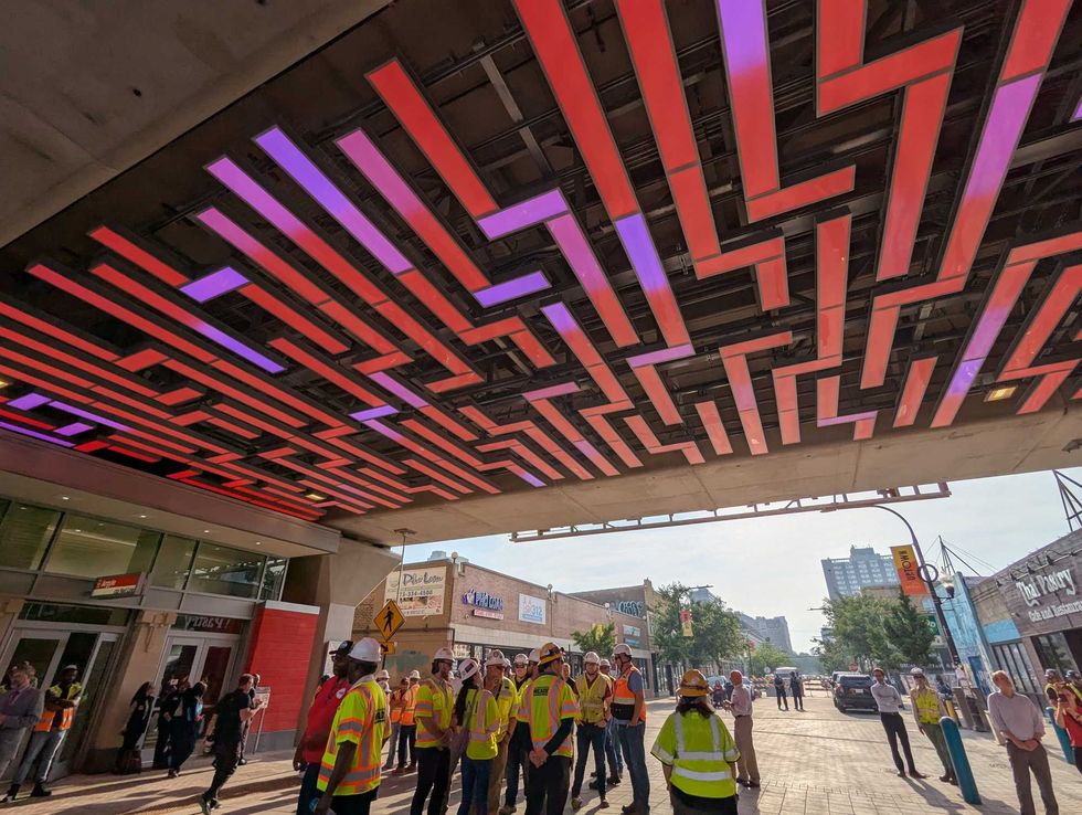 Light fixture artwork under Argyle platform